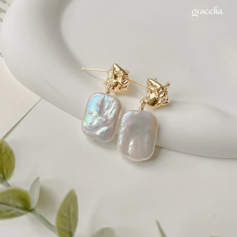 The Best Luminous Lava Stone Pearl Drop Earrings: How They Add a Touch of Untamed Beauty to Any Outfit!
